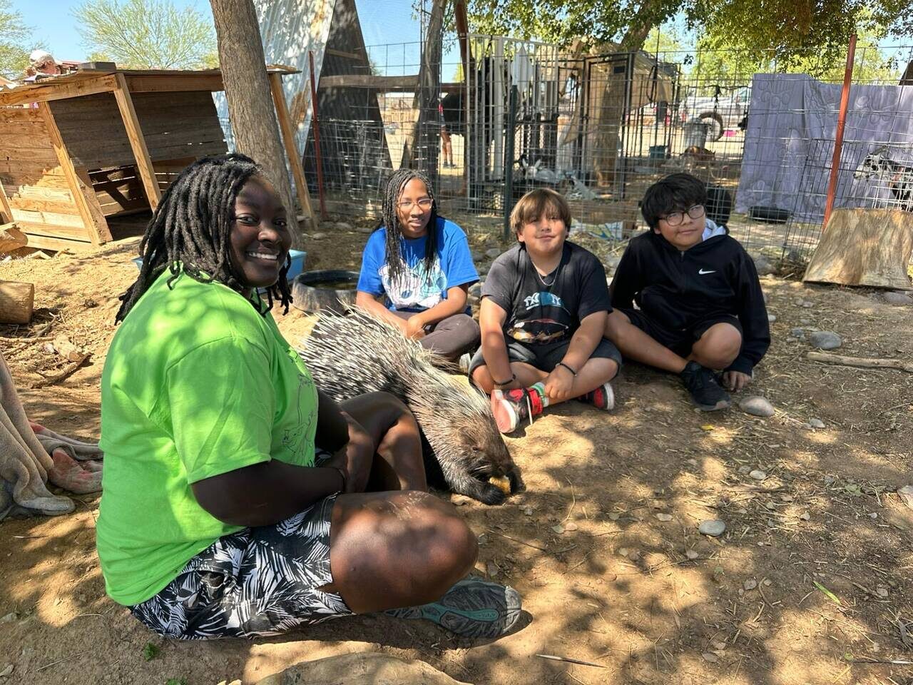 Children participating in animal critter camp activities at The Gud Ark Animal Sanctuary